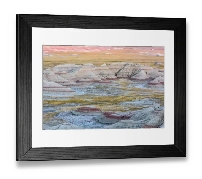Framed Print : A circular grouping of hoodoo mounds, interspersed with yellow grasses, pinks and red mixed in Framed Print : A circular grouping of hoodoo mounds, interspersed with yellow grasses, pinks and red mixed in