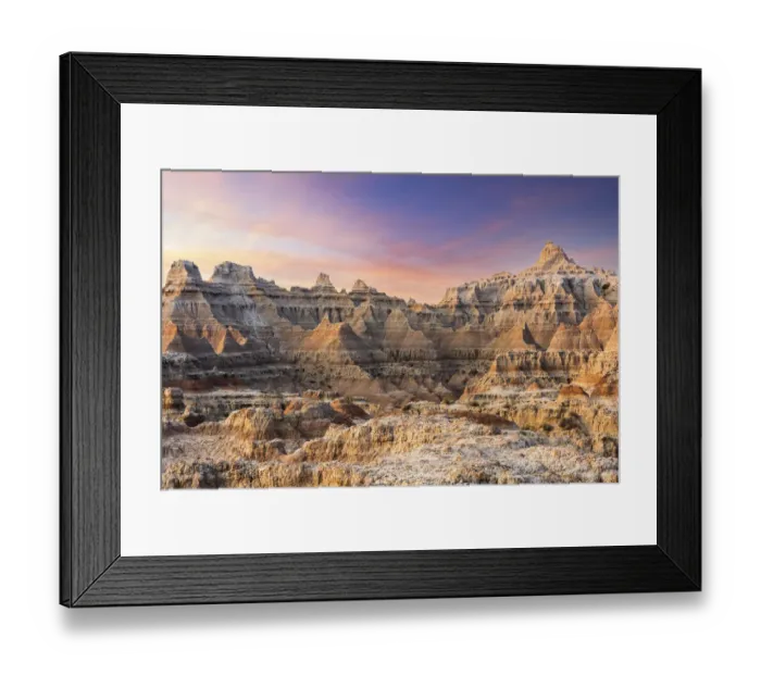 Framed Print : Magnificent set of striated hoodoos set against the backdrop of sunset colors in the sky Framed Print : Magnificent set of striated hoodoos set against the backdrop of sunset colors in the sky