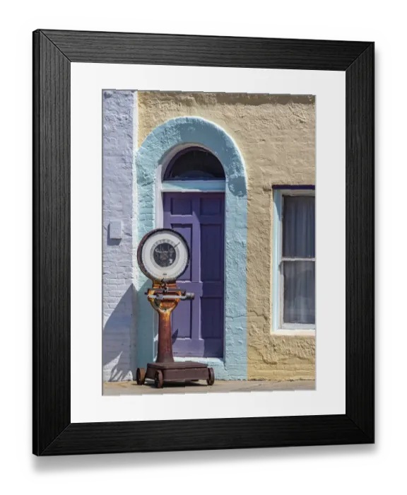 Framed Print : USA, Washington State, Pomeroy. Colorful old building with arched windows and doorway with scale Framed Print : USA, Washington State, Pomeroy. Colorful old building with arched windows and doorway with scale