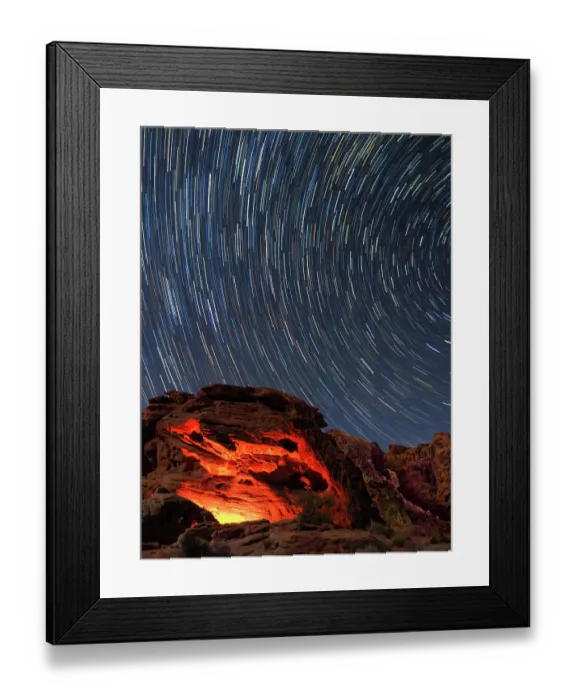 Framed Print : Usa, Nevada. Valley of Fire State Park, star trails and campfire glowing in sandstone rocks Framed Print : Usa, Nevada. Valley of Fire State Park, star trails and campfire glowing in sandstone rocks