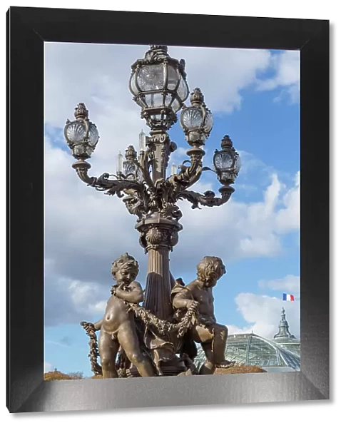 Paris. Decorative street lamps, at Pont Alexandre III, along River Seine