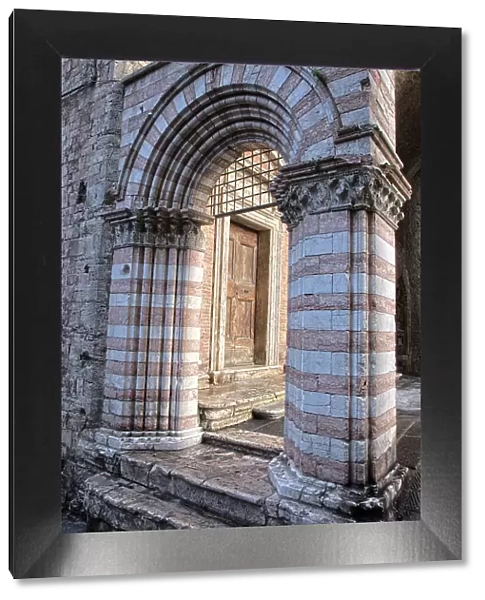 Italy, Umbria, Perugia. Striped archway near the Cathedral of San Lorenzo in Piazza IV Novembre