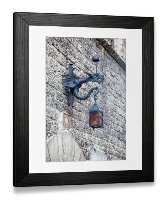 Framed Print : Italy, Umbria, Assisi. Old stone wall with Dragon Lantern