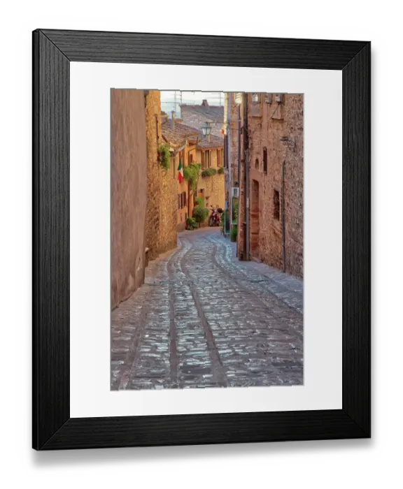 Framed Print : Italy, Umbria. Cobblestone street in the town of Spello