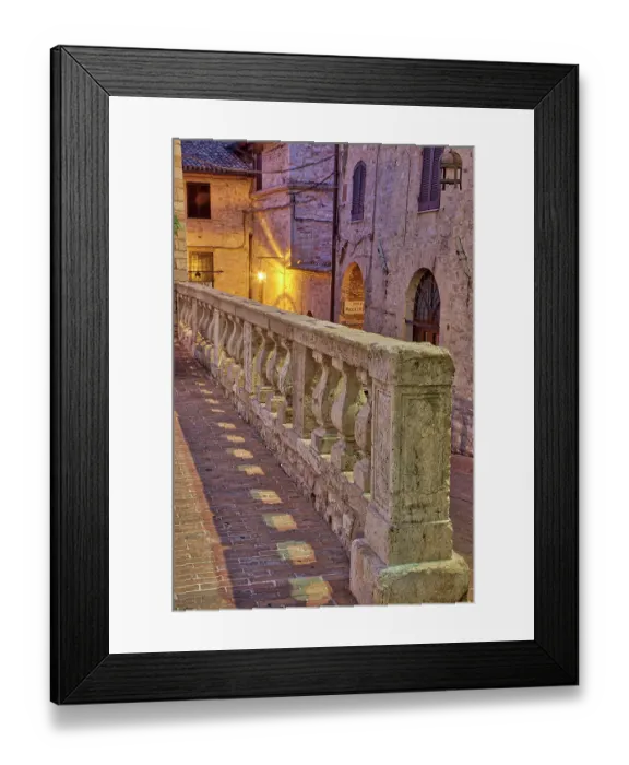 Framed Print : Italy, Umbria, Assisi. Short stone wall with columns near the Convento Chiesa Nuova