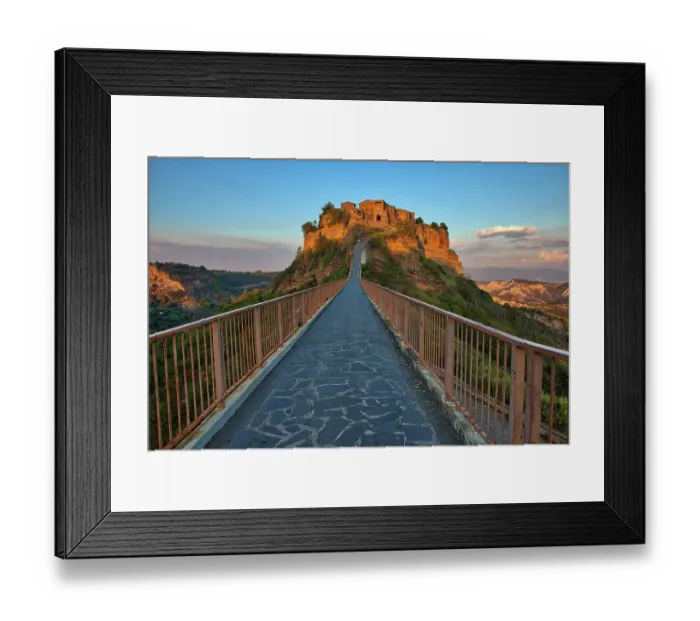 Framed Print : Italy, Tuscany. Evening light of Civita di Bagnoregio and the long bridge leading to town Framed Print : Italy, Tuscany. Evening light of Civita di Bagnoregio and the long bridge leading to town