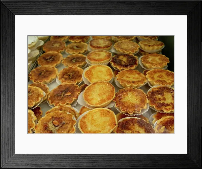 Framed Print : Lisbon, Portugal. Traditional Portuguese pastries. Nata's are the national dessert Framed Print : Lisbon, Portugal. Traditional Portuguese pastries. Nata's are the national dessert