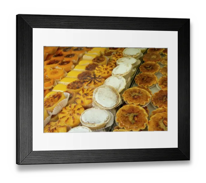 Framed Print : Lisbon, Portugal. Traditional Portuguese pastries. Nata's are the national dessert Framed Print : Lisbon, Portugal. Traditional Portuguese pastries. Nata's are the national dessert