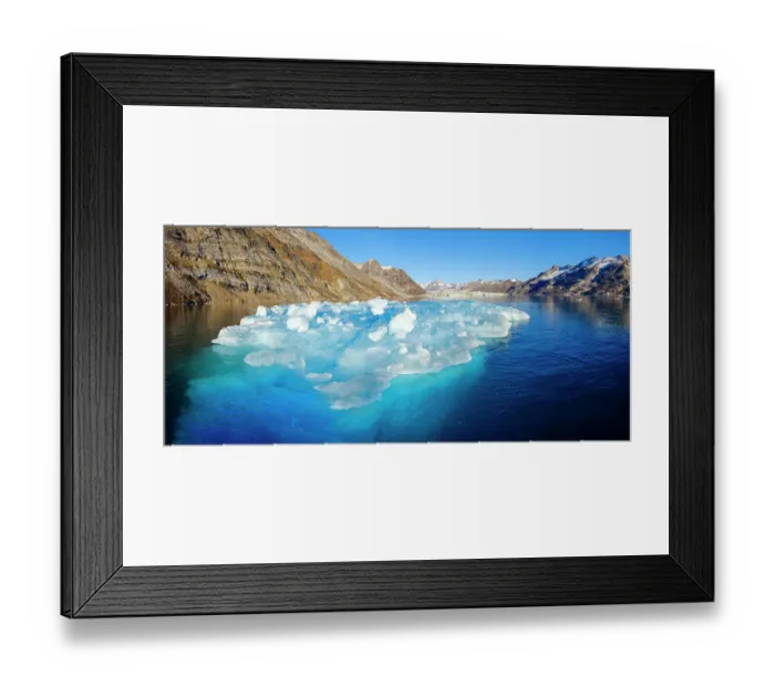 Framed Print : Iceberg in front of Knud Rasmusen Glacier (also called Apuseeq Glacier) in Sermiligaaq Fjord. Ammassalik region in the north east of Greenland. North America, Greenland, Ammassalik, danish territory, October Framed Print : Iceberg in front of Knud Rasmusen Glacier (also called Apuseeq Glacier) in Sermiligaaq Fjord. Ammassalik region in the north east of Greenland. North America, Greenland, Ammassalik, danish territory, October