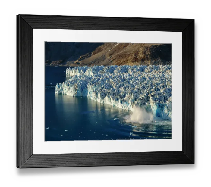 Framed Print : Ice calving. Knud Rasmussen Glacier (also called Apuseeq Glacier) in Sermiligaaq Fjord, Ammassalik, Danish Territory