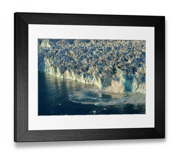 Framed Print : Ice calving. Knud Rasmussen Glacier (also called Apuseeq Glacier) in Sermiligaaq Fjord, Ammassalik, Danish Territory Framed Print : Ice calving. Knud Rasmussen Glacier (also called Apuseeq Glacier) in Sermiligaaq Fjord, Ammassalik, Danish Territory