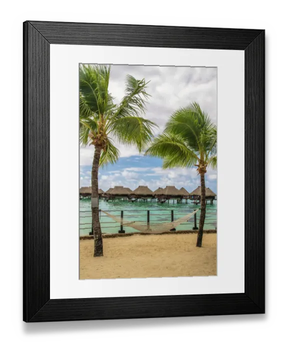 Framed Print : French Polynesia, Moorea. Overwater bungalows and hammock