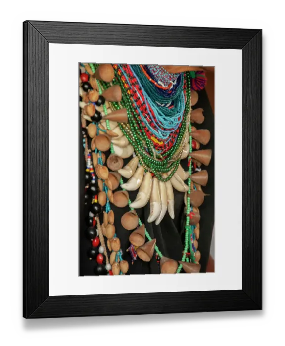 Framed Print : The elaborate regalia of a shaman in the Amazon jungle features jaguar teeth and beads