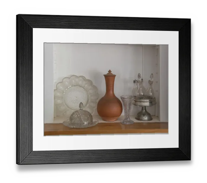 Framed Print : Old glass and serving ware in a ghost town