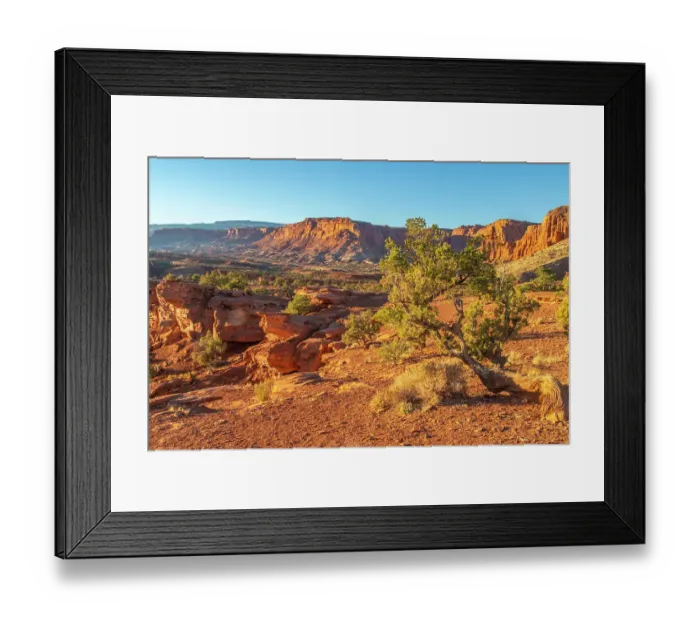 Framed Print : USA, Utah, Capitol Reef National Park. Eroded rock formations and mountains