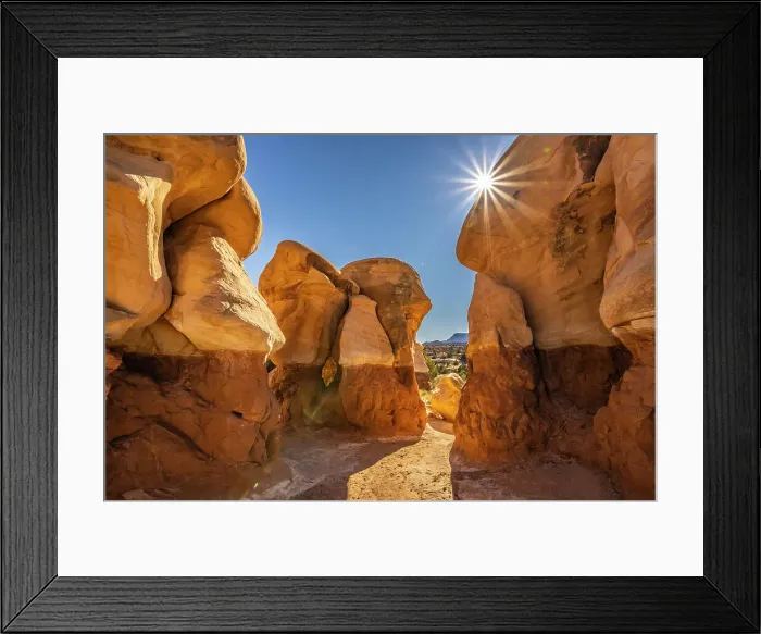 Framed Print : USA, Utah, Devil's Garden Outstanding Natural Area. Sun starburst on hoodoo rock formations Framed Print : USA, Utah, Devil's Garden Outstanding Natural Area. Sun starburst on hoodoo rock formations