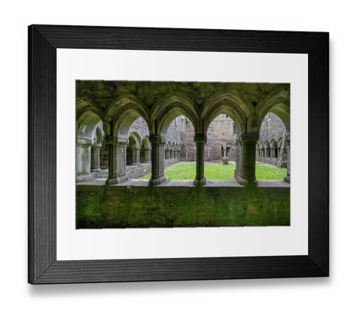 Framed Print : Ancient cloisters surround this patch of grass at Moyne Abbey, County Mayo, Ireland Framed Print : Ancient cloisters surround this patch of grass at Moyne Abbey, County Mayo, Ireland