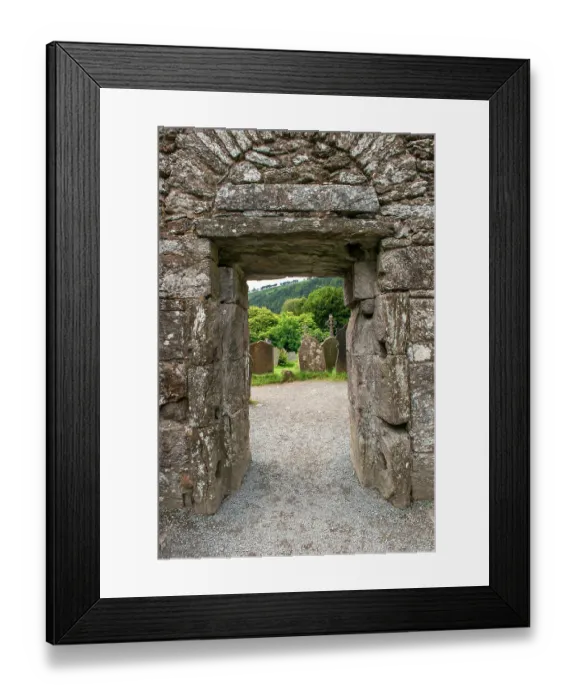 Framed Print : Ancient door marks the passageway between the old church and graveyard at Glendalough Monastery Framed Print : Ancient door marks the passageway between the old church and graveyard at Glendalough Monastery