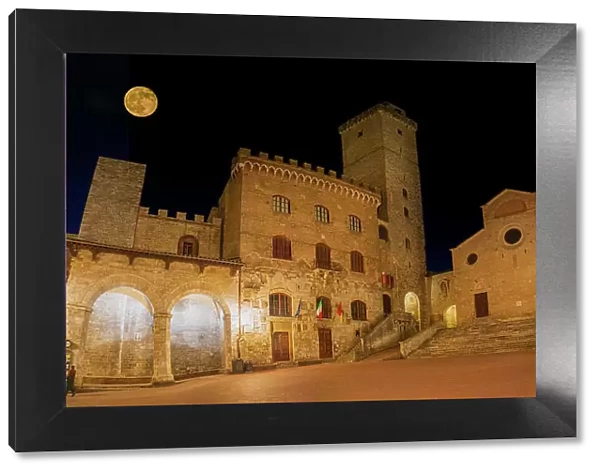 Full moon over center of San Gimignano. A Unesco World Heritage Site. Tuscany, Italy