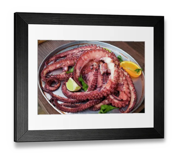 Framed Print : Lisbon, Portugal. Traditional grilled octopus