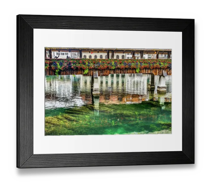 Framed Print : Kapellbrucke over Reuss River, Lucerne, Switzerland. Built in 1365 almost burned down in 1993 Framed Print : Kapellbrucke over Reuss River, Lucerne, Switzerland. Built in 1365 almost burned down in 1993