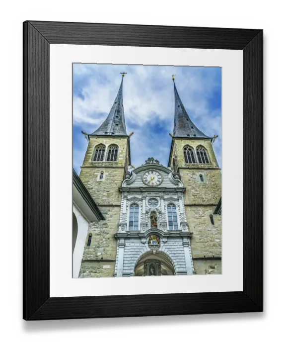 Framed Print : Church of St. Leodegar Facade, Lucerne, Switzerland. St. Michael statue Originally a monastery in 1100's became a church in 1874