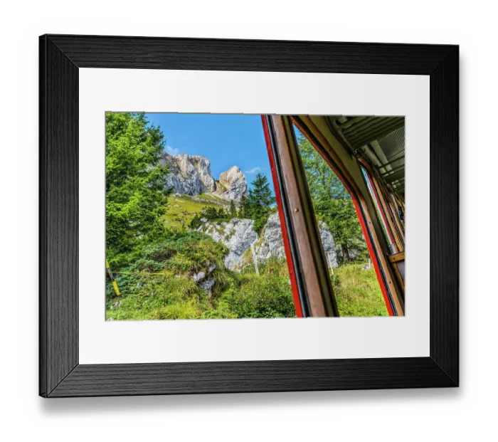 Framed Print : Colorful cogwheel rail car climbing Mount Pilatus, Lucerne, Switzerland Framed Print : Colorful cogwheel rail car climbing Mount Pilatus, Lucerne, Switzerland