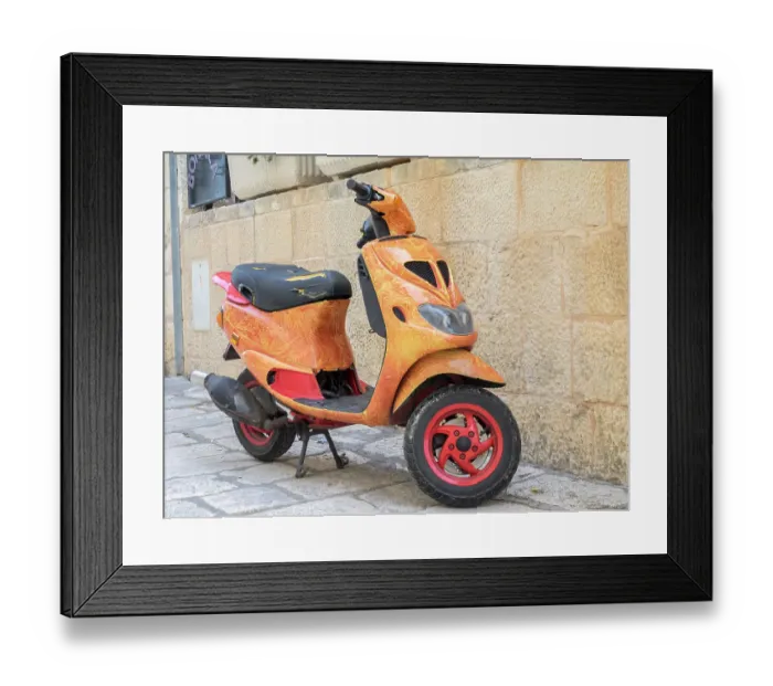 Framed Print : Croatia, Hvar. Bright orange vespa bike in the town of Hvar. (Editorial Use Only) Framed Print : Croatia, Hvar. Bright orange vespa bike in the town of Hvar. (Editorial Use Only)