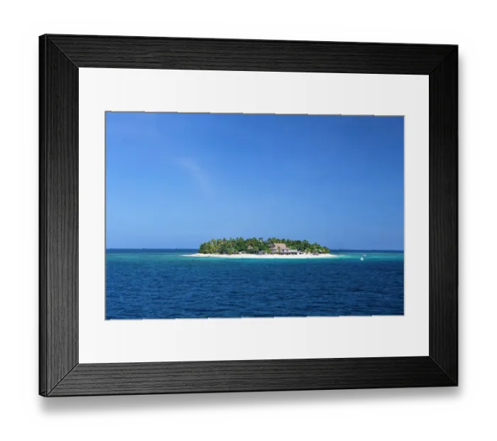 Framed Print : Fiji. Boats head towards Beachcomber Island, in the Mamanuca Island chain. This island is known as the party island of Fiji