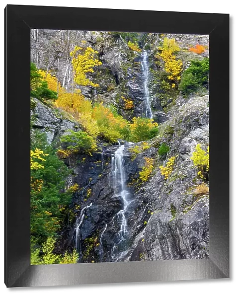 USA, Washington State, east of Newhalem highway 20 waterfall with fall colors