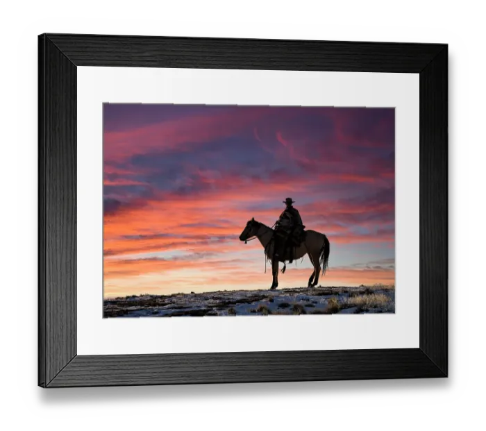 Framed Print : USA, Shell, Wyoming. Hideout Ranch cowgirl silhouetted on horseback at sunset. (PR, MR)