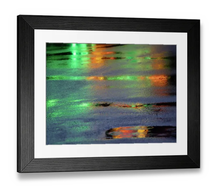 Framed Print : Lights reflected in puddles on asphalt path Framed Print : Lights reflected in puddles on asphalt path