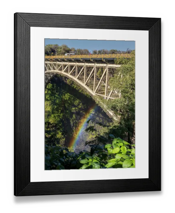 Framed Print : Bridge over the Zambesi River with rainbow. Bordering Zambia and Zimbabwe. Zambezi National Park. Zimbabwe