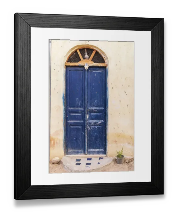Framed Print : Faiyum, Egypt. A blue painted door on a building Framed Print : Faiyum, Egypt. A blue painted door on a building