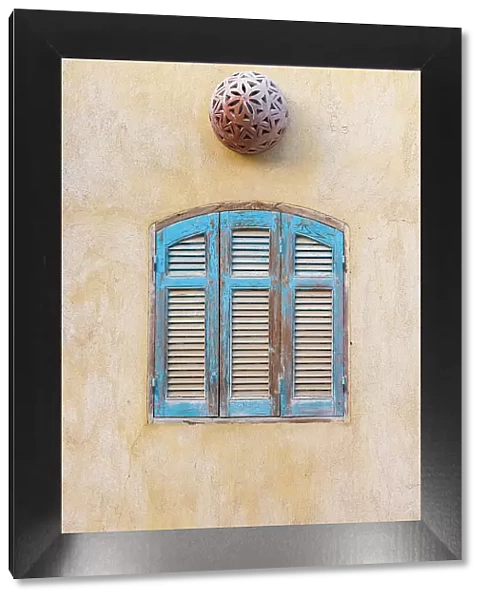 Faiyum, Egypt. Blue wooden shutters