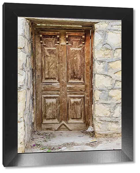 Faiyum, Egypt. Wooden door in a wall