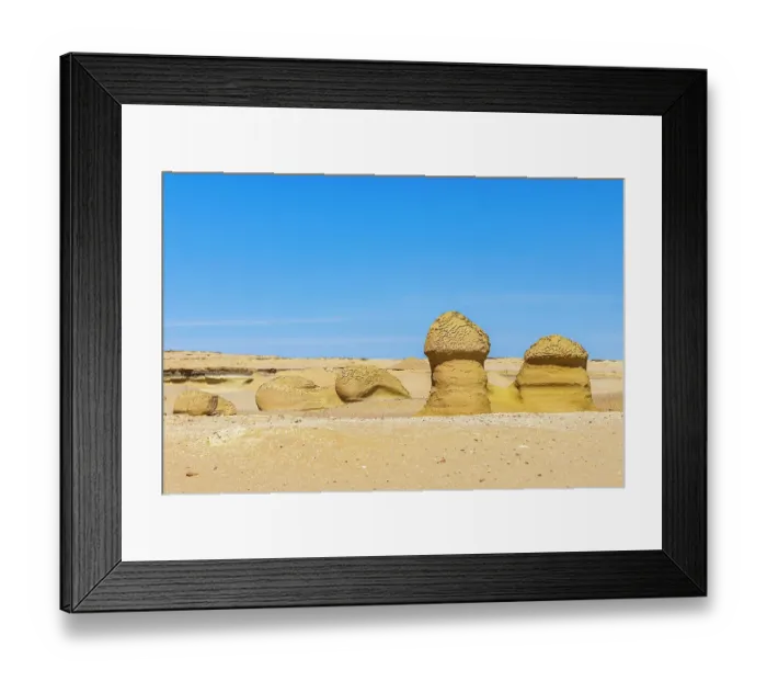 Framed Print : Wadi al Hitan, Faiyum, Egypt. Eroded rocks along the interpretive trail at Wadi el-Hitan paleontological site Framed Print : Wadi al Hitan, Faiyum, Egypt. Eroded rocks along the interpretive trail at Wadi el-Hitan paleontological site