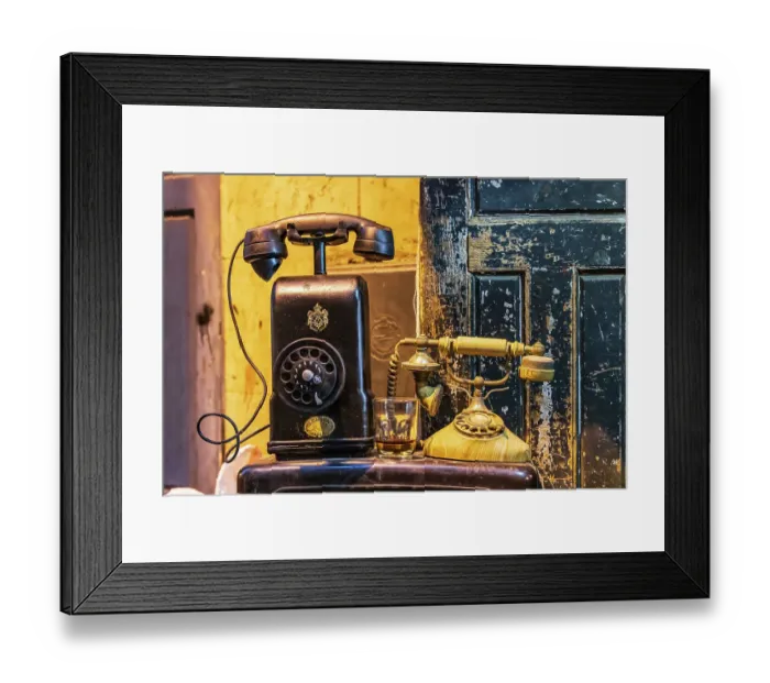 Framed Print : Cairo, Egypt. Antique telephones at a shop on El Moez street in Old Cairo. (Editorial Use Only)
