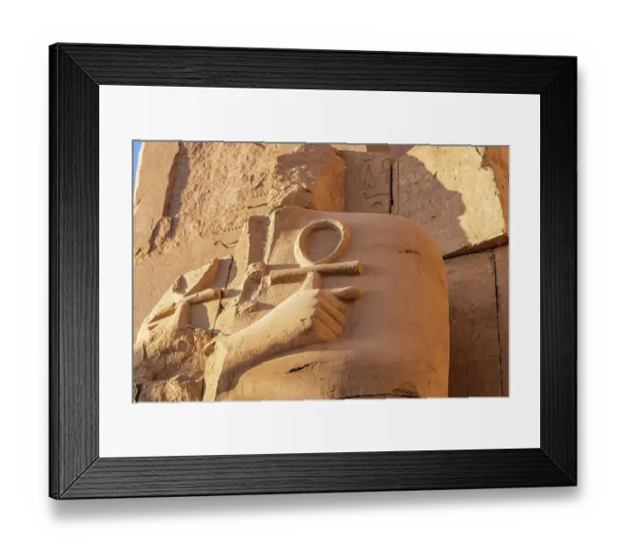 Framed Print : Karnak, Luxor, Egypt. Ruined statue holding two ankhs at the Karnak Temple Complex