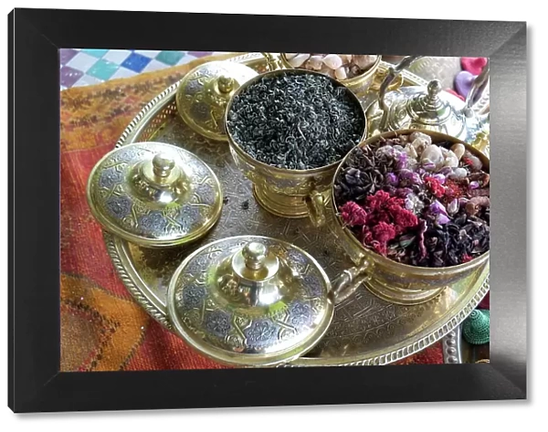 Marrakech, Morocco. Tea set with herbs, flowers and spices