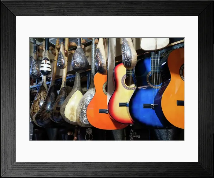 Framed Print : Fes, Morocco. Traditional musical instruments for sale at a music shop in the medina Framed Print : Fes, Morocco. Traditional musical instruments for sale at a music shop in the medina