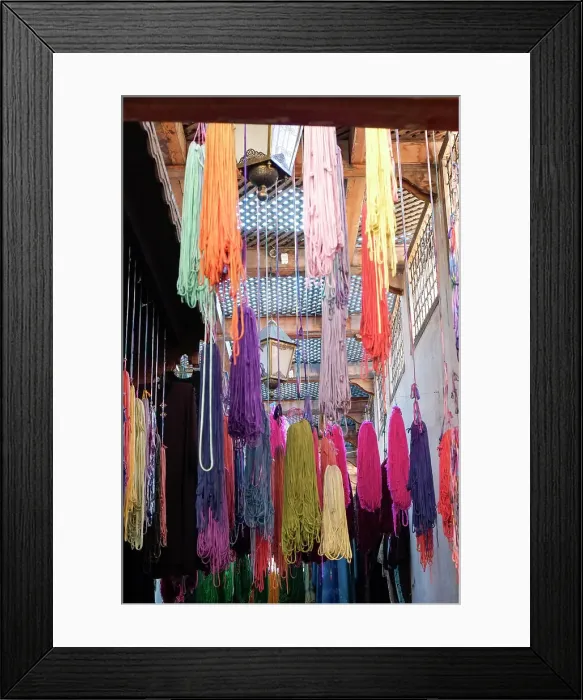 Framed Print : Fes, Morocco. Skeins of yarn hang to dry after being hand dyed
