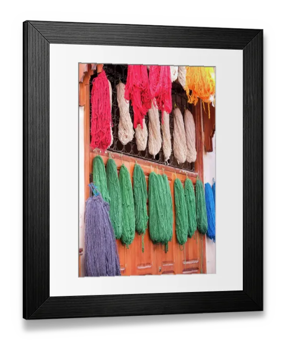 Framed Print : Fes, Morocco. Skeins of yarn hang to dry after being hand dyed