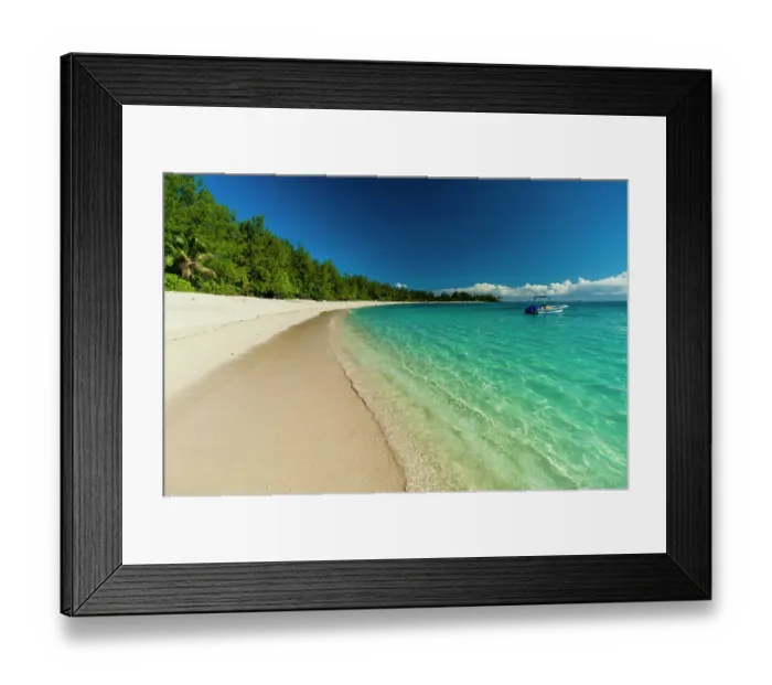 Framed Print : A boat anchored off the shore of a pristine tropical beach. Denis Island, Seychelles Framed Print : A boat anchored off the shore of a pristine tropical beach. Denis Island, Seychelles