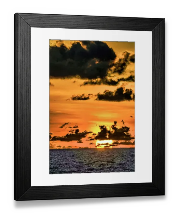 Framed Print : The crimson light of the setting sun reflects a red glow on the beach at Pererenan Beach, Bali, Indonesia Framed Print : The crimson light of the setting sun reflects a red glow on the beach at Pererenan Beach, Bali, Indonesia