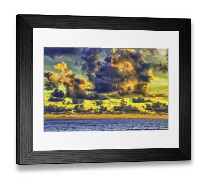 Framed Print : The golden light of the swirling clouds sunset reflects a pink glow on the beach at Pererenan Beach, Bali, Indonesia Framed Print : The golden light of the swirling clouds sunset reflects a pink glow on the beach at Pererenan Beach, Bali, Indonesia