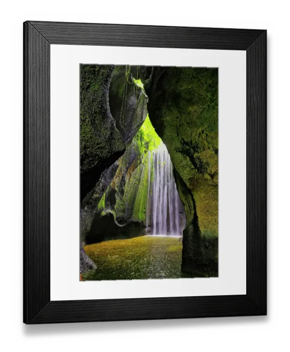Framed Print : Tukad Cepung Waterfall in the central mountains of Bali, Indonesia. Carved through an underground canyon Framed Print : Tukad Cepung Waterfall in the central mountains of Bali, Indonesia. Carved through an underground canyon