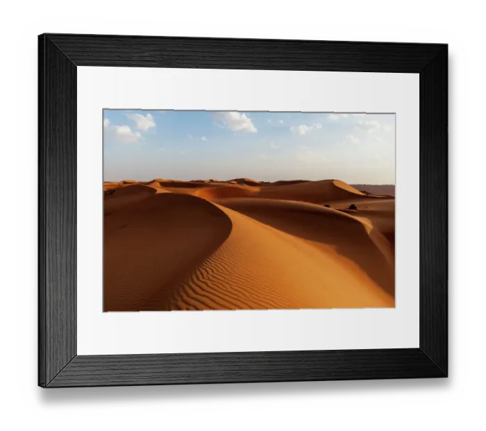 Framed Print : A desert landscape of wind sculpted and rippled sand dunes. Wahiba Sands, Oman Framed Print : A desert landscape of wind sculpted and rippled sand dunes. Wahiba Sands, Oman
