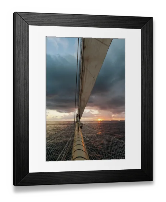 Framed Print : A view of the sunrise from the prow of a Star Clipper cruise ship sailing in the Caribbean near Nevis Island. Caribbean Sea near Nevis Island, West Indies Framed Print : A view of the sunrise from the prow of a Star Clipper cruise ship sailing in the Caribbean near Nevis Island. Caribbean Sea near Nevis Island, West Indies