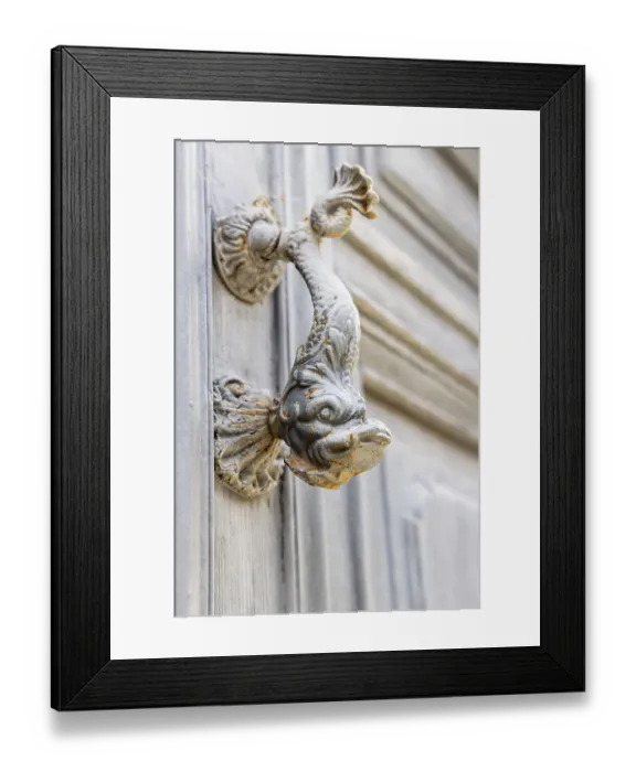 Framed Print : Aigues-Mortes, Gard, Occitania, France. Old door knocker in the shape of a fish Framed Print : Aigues-Mortes, Gard, Occitania, France. Old door knocker in the shape of a fish